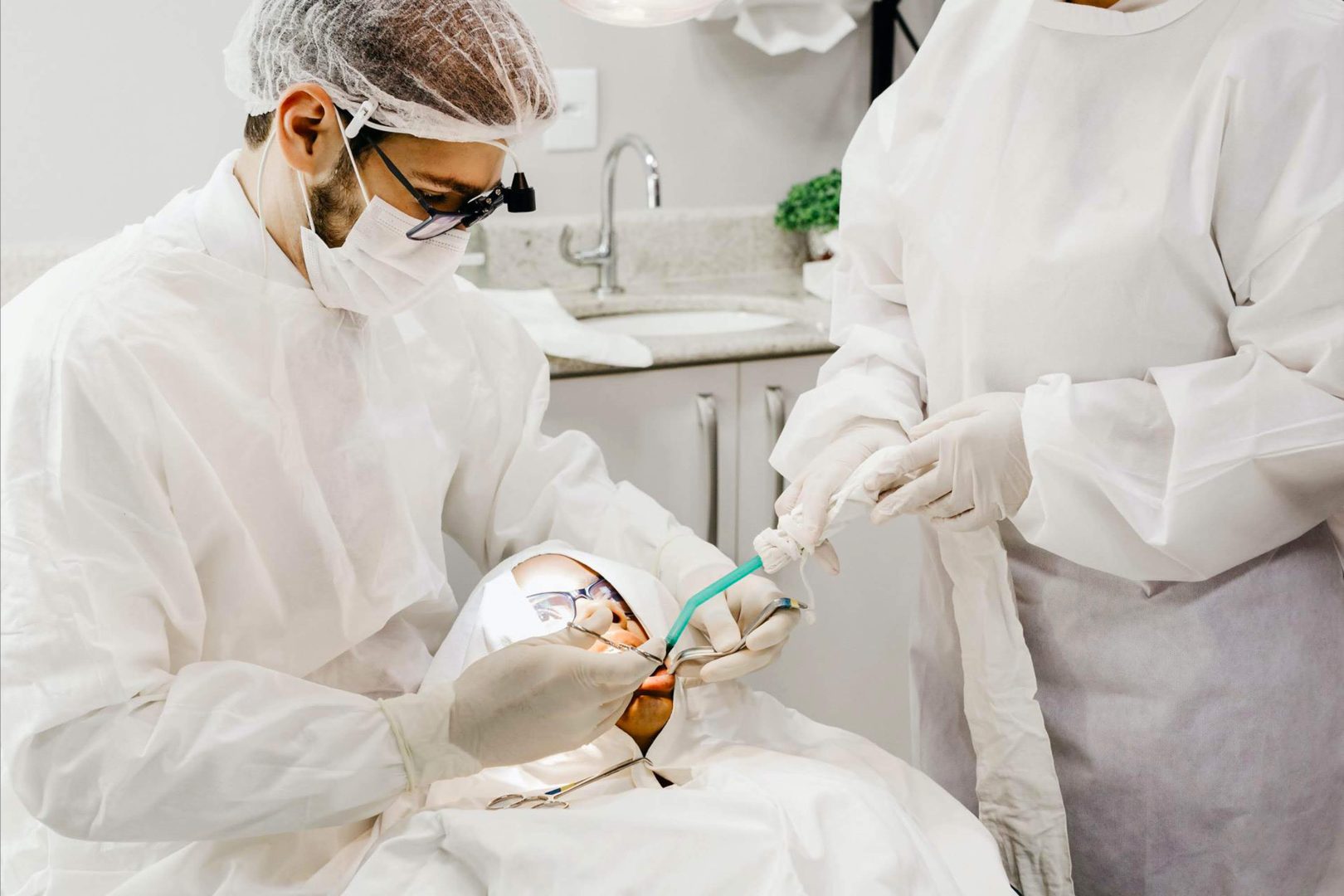 Dental assistant during in-person practicum as part of Risio's program