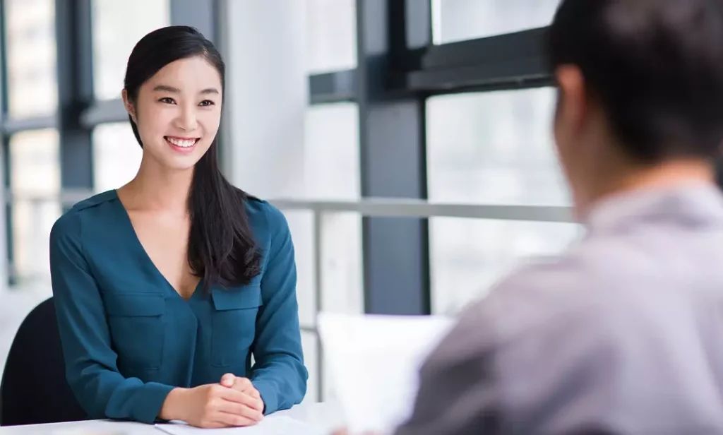 Woman sitting across from job interviewer